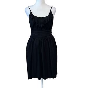 LBD Adjustable straps ruffle at neck waist has pleated front gathered back ties